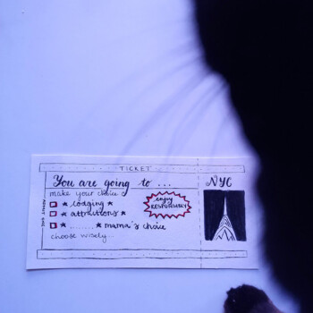 Tombow calligraphy pen, created for a friend as a way to gift traveling together. picture of a drawing of a travel ticket with a black cat in foreground