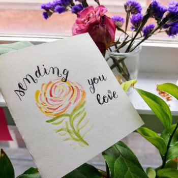 Watercolour, Tombow calligraphy pen, a greeting card for a friend. picture of a card with calligraphy font saying "sending you love" and a flower