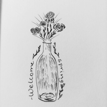 Micron pen. picture of a drawing of a vase with flowers that says "welcome spring" on the sides